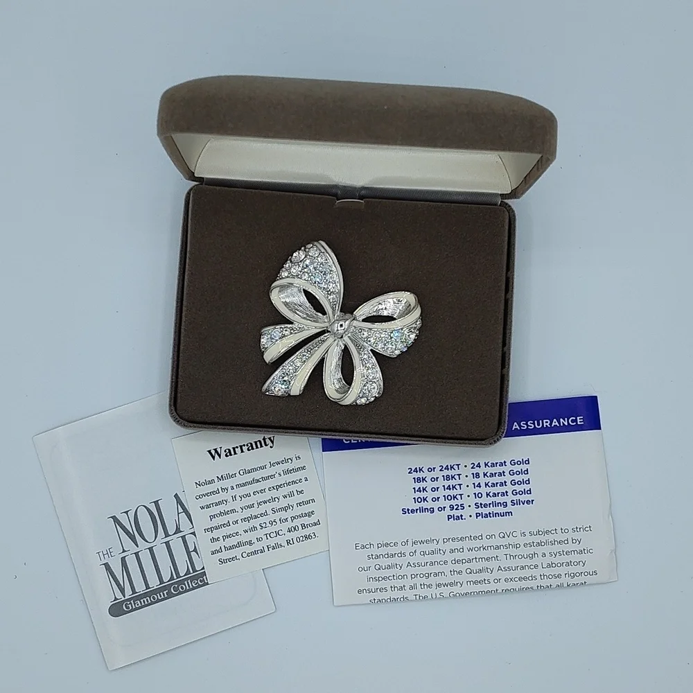 Vintage NIB Nolan Miller Silver-tone Bow Brooch With Rhinestones